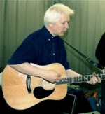 Tom Fairnie playing guitar